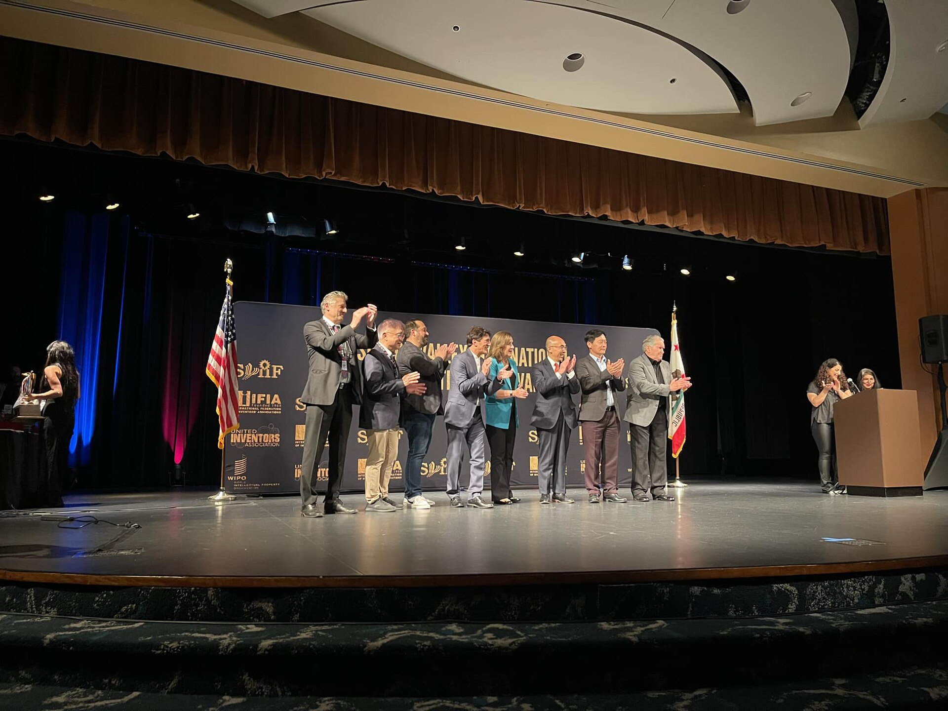 Award ceremony on stage with international jury members and organizers of SVIIF