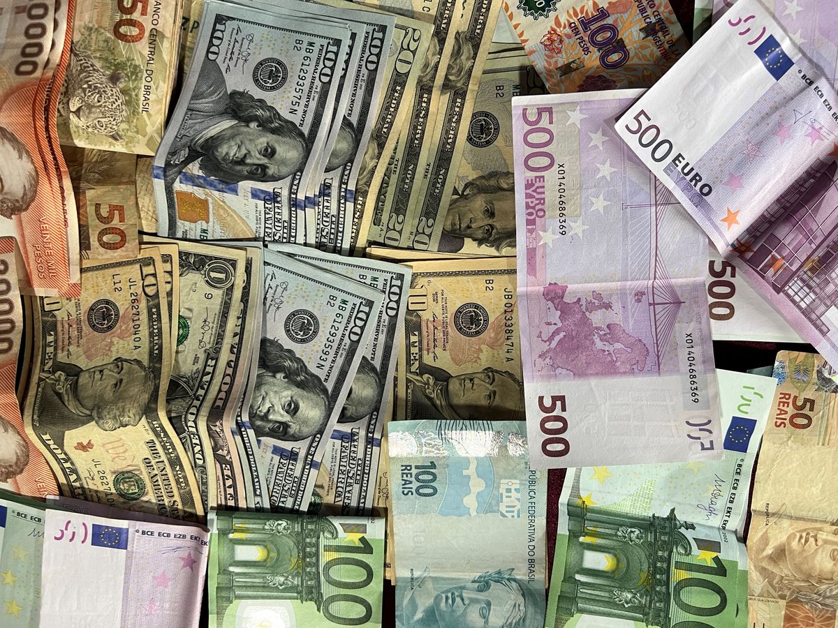International banknotes pile featuring various currencies