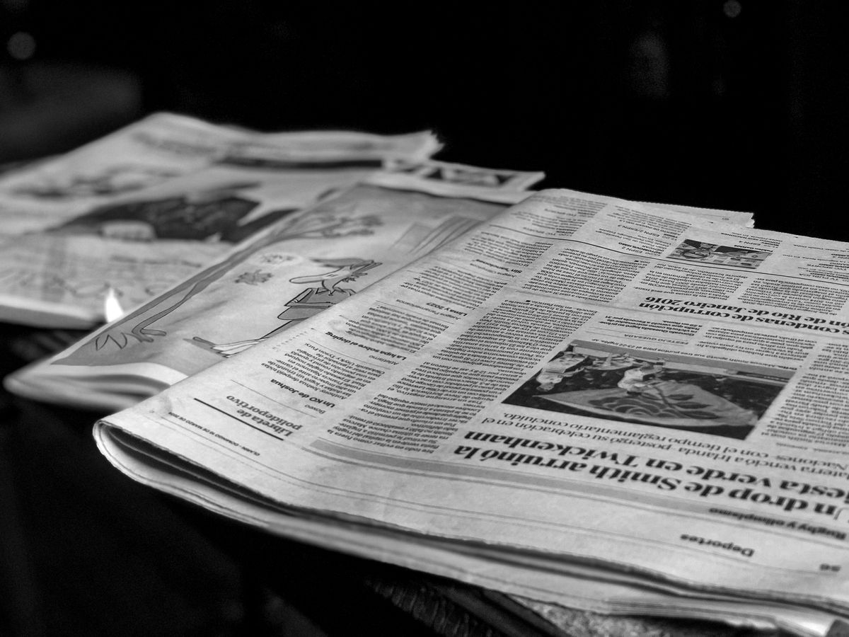 Newspapers on table