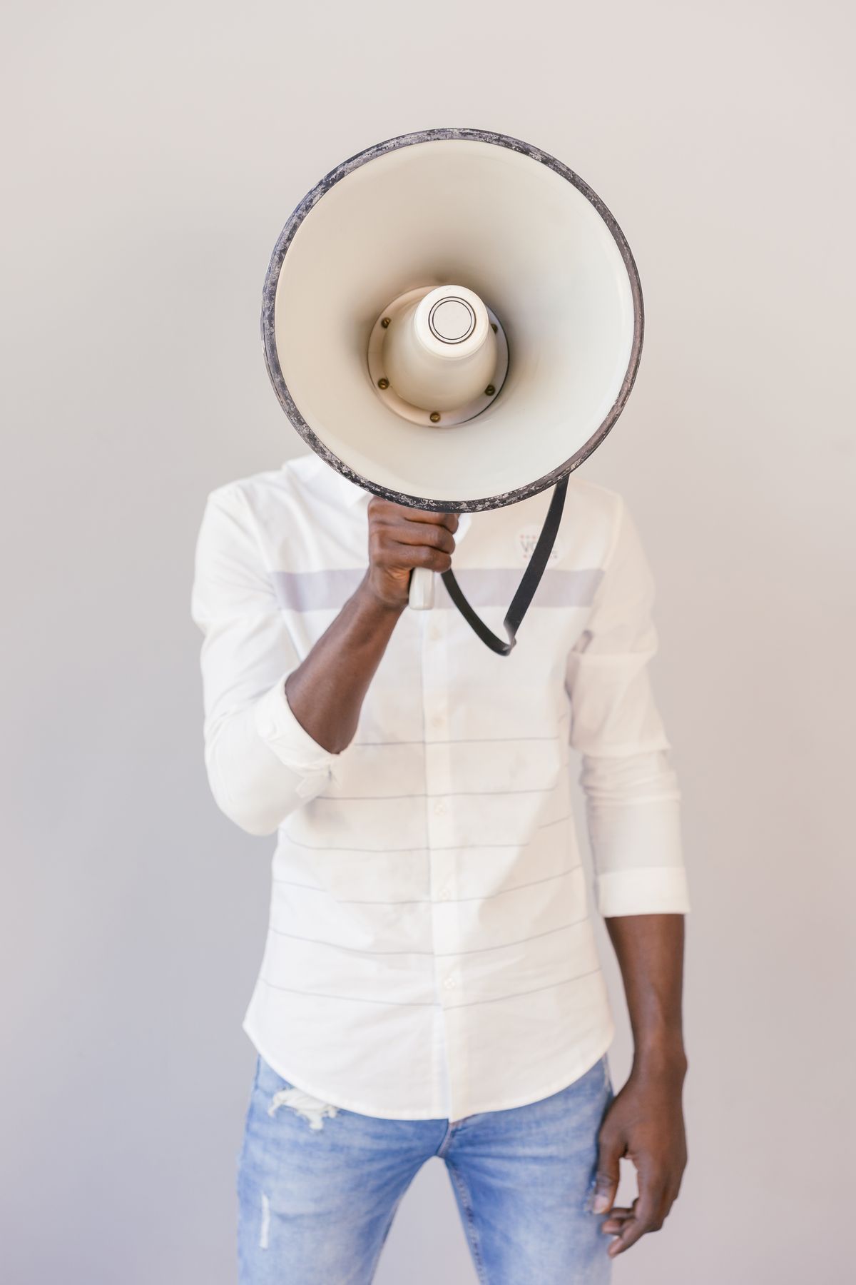 Person holding a megaphone